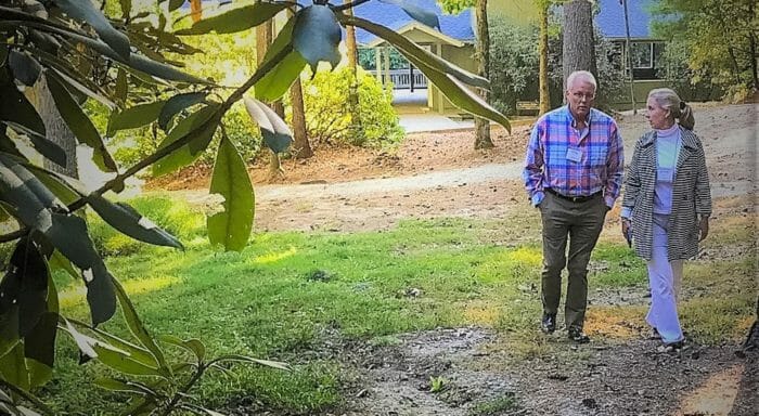 Adult walking at Camp Kanuga