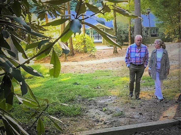 Adult walking at Camp Kanuga